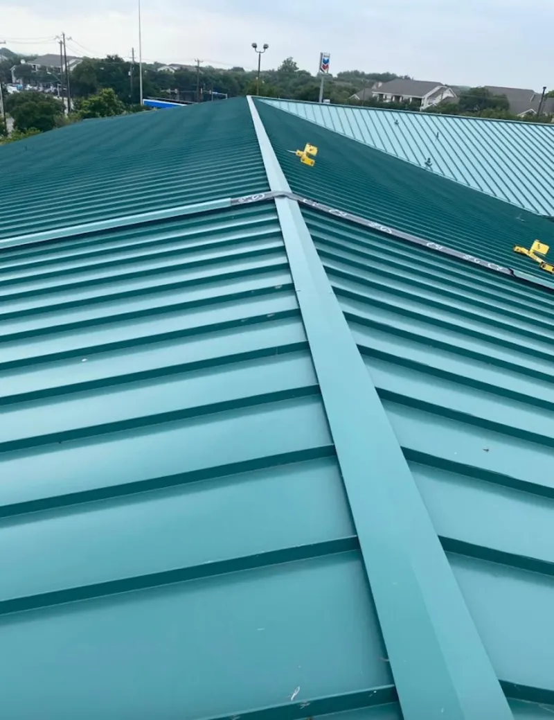 Green commercial metal roof ridge and valley for Metal Roof Repair in Normal